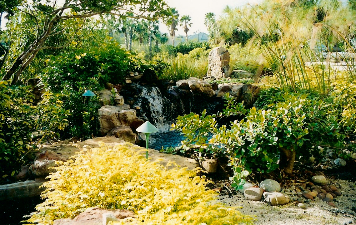 CUSTOM KOI POND AND WATERFALL